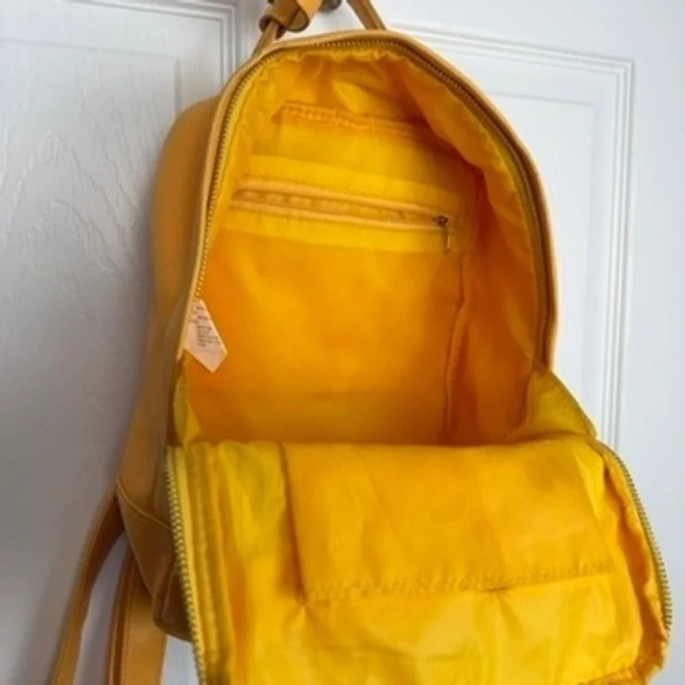 Yellow Faux Leather Small Backpack Pocket Front‎ Zip Closure Adjustable Straps